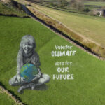 Spray paint art on Hebden Bridge pastures to observe Earth Day