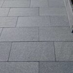 Rustic Elegance: Mixing Sandstone and Cobblestone Tiles for a Unique Outdoor Aesthetic